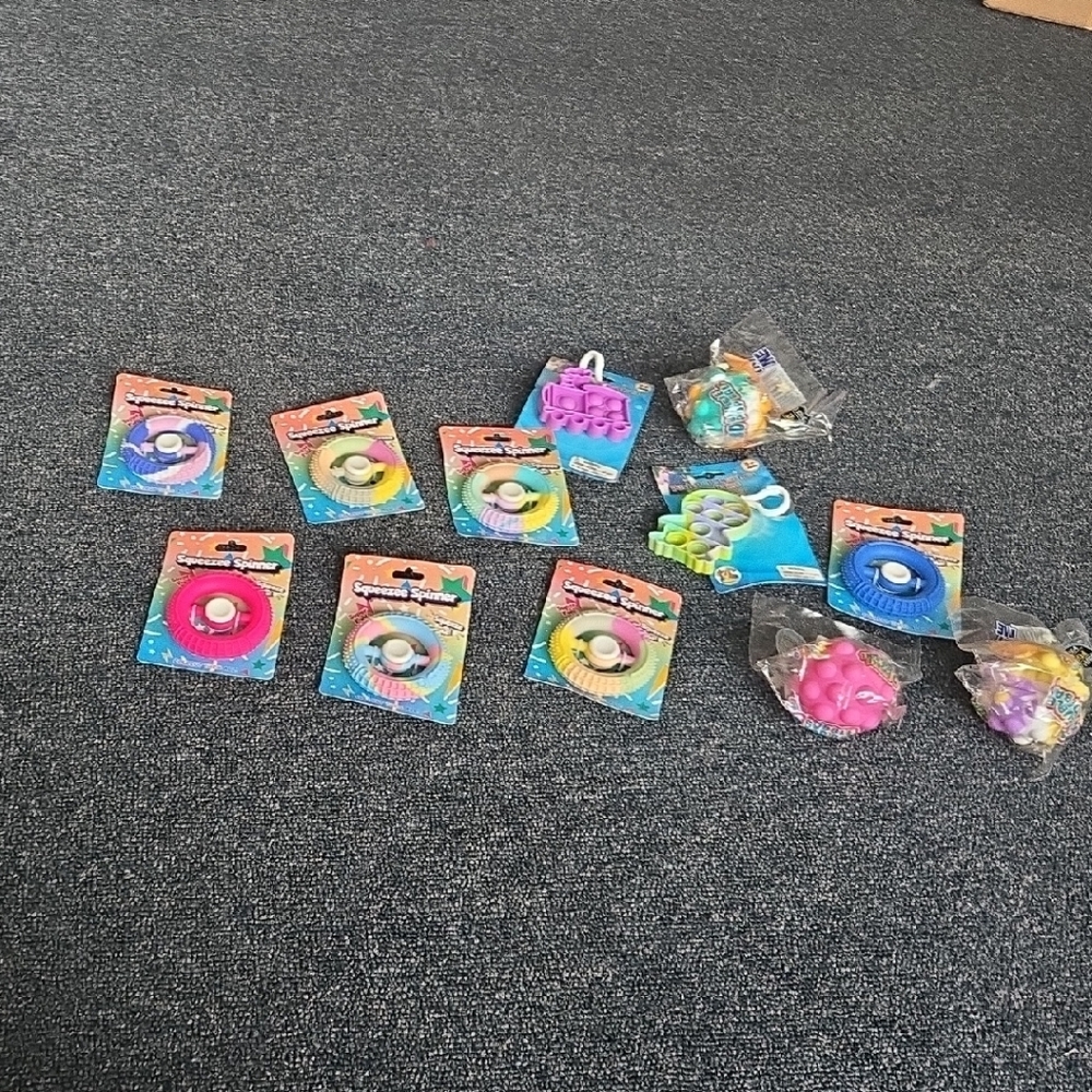 Brand New Fidget Toy Set Of 12.